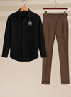 Black shirt with logo and brown pants